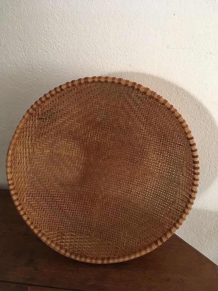 Round basket in braided folder
