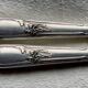 Set of 12 silver-plated metal table knives in Art Nouveau style.