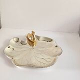 Un vide poche Lancel en métal argenté.