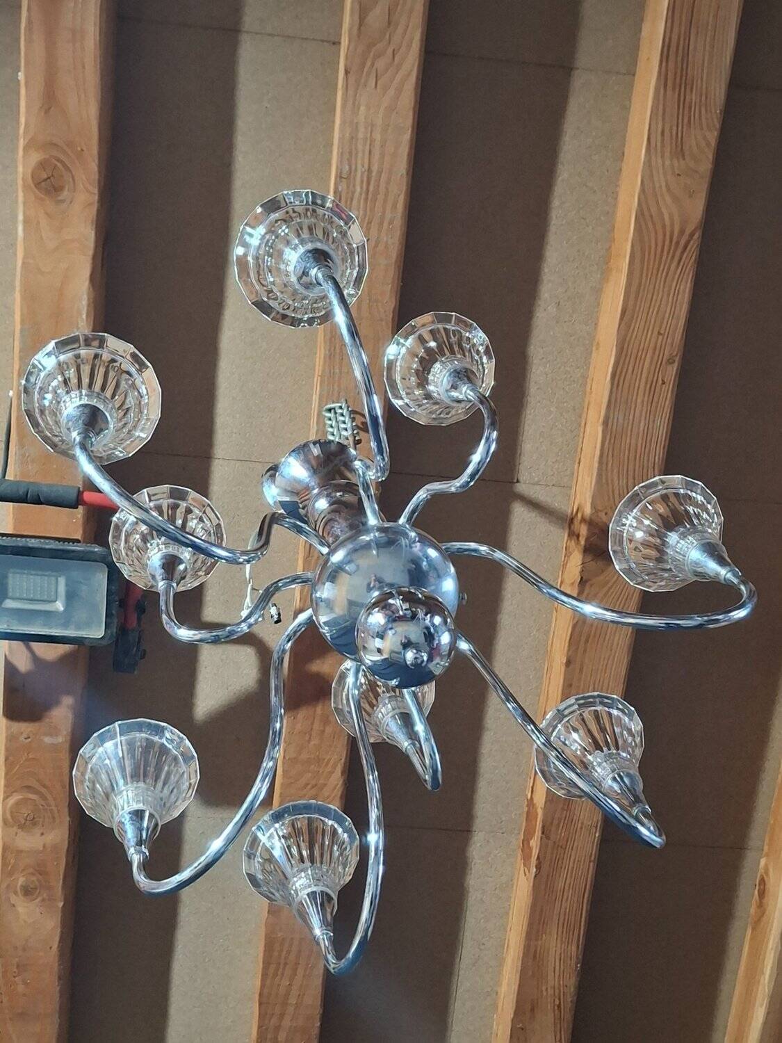Chandelier from the 1930s to 1950s in chrome metal and thick glass.