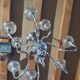 Chandelier from the 1930s to 1950s in chrome metal and thick glass.