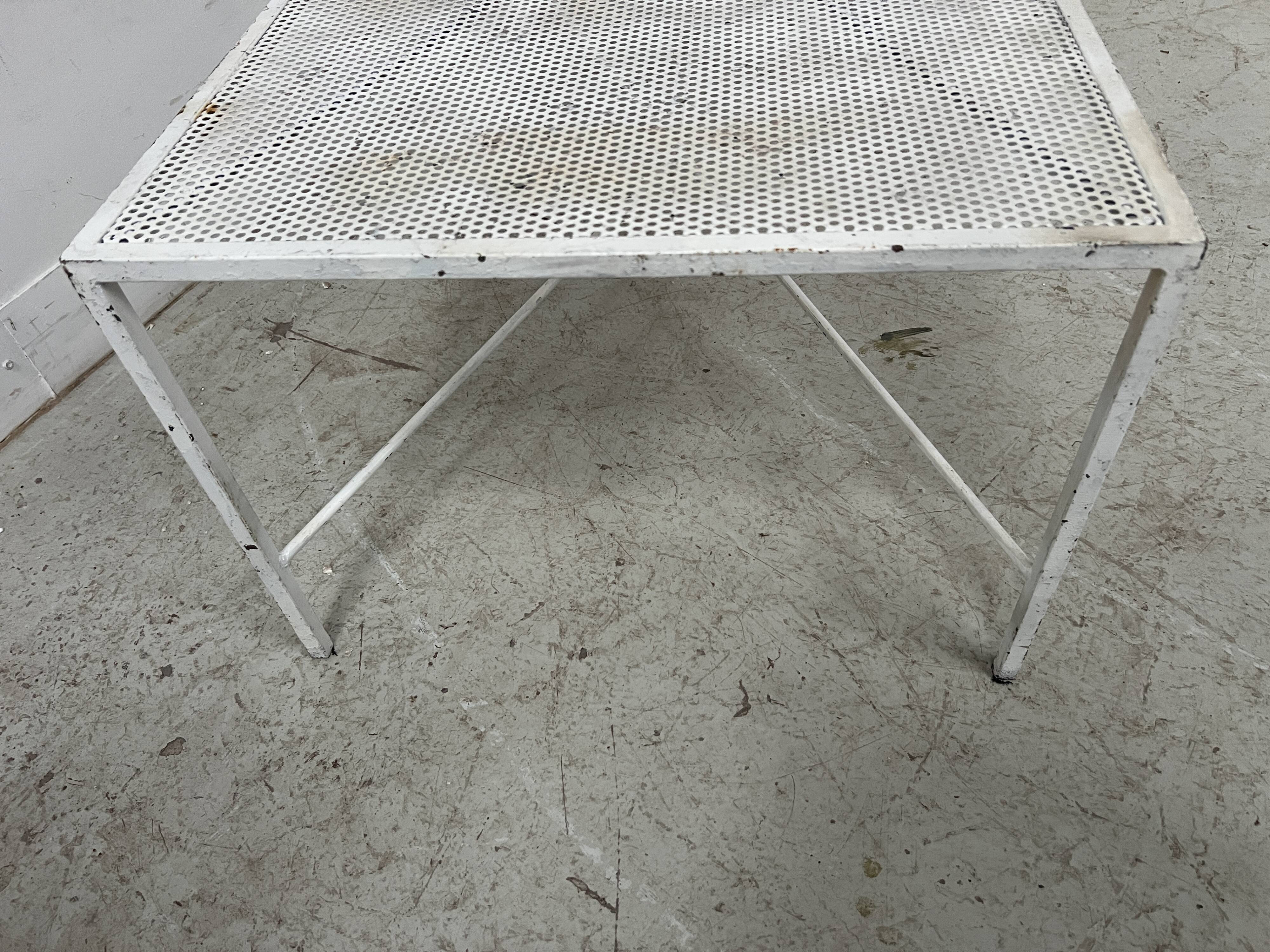 Painted wrought iron coffee table, 20th century.