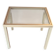 White lacquered side table by Pierre Vandel with gold brass.