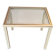 White lacquered side table by Pierre Vandel with gold brass.