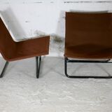 Pair of KEBE drivers, Denmark, circa 1975. Steel and "chocolate" canvas