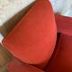 Vintage cubic armchair covered with red fabric