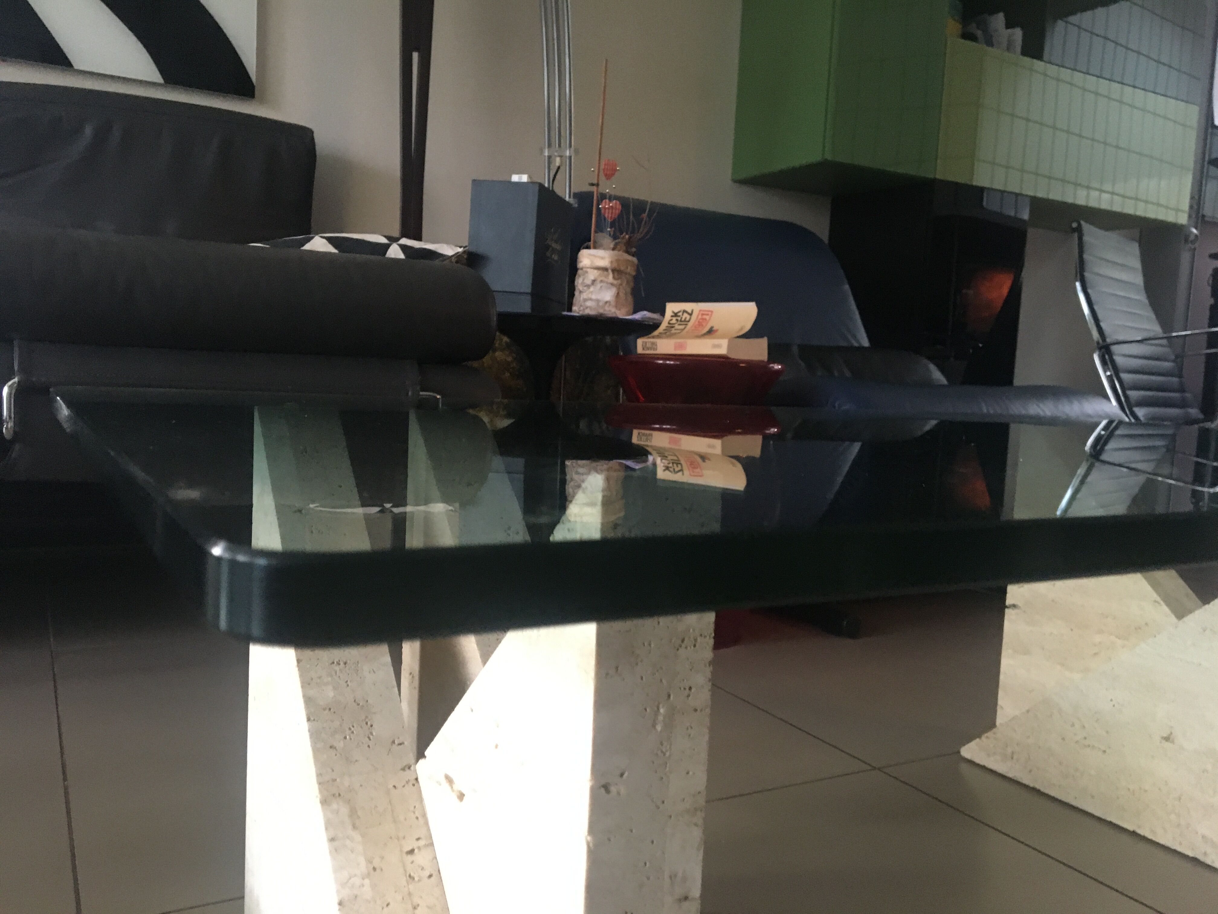 Design coffee table in travertine and glass