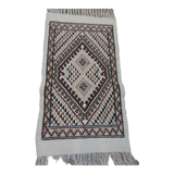 White carpet with multicolored Berber patterns handmade