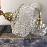 Pair of chiseled glass wall sconces