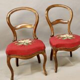 Pair of Louis Philippe walnut chairs, petit point tapestry