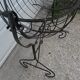 Former cradle in wrought iron