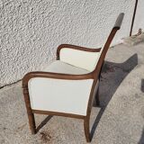 Fauteuil empire en noyer fonce du XIXème siecle