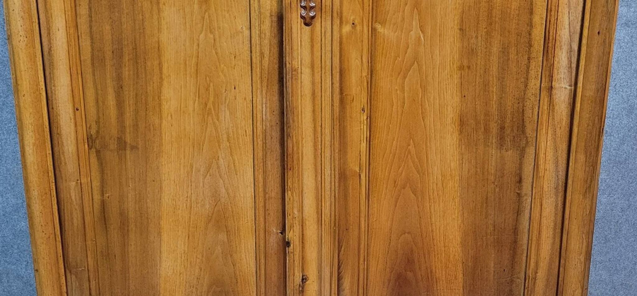 Empire period wardrobe, made of solid walnut, dating from the early 19th century.