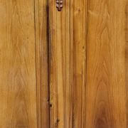 Empire period wardrobe, made of solid walnut, dating from the early 19th century.