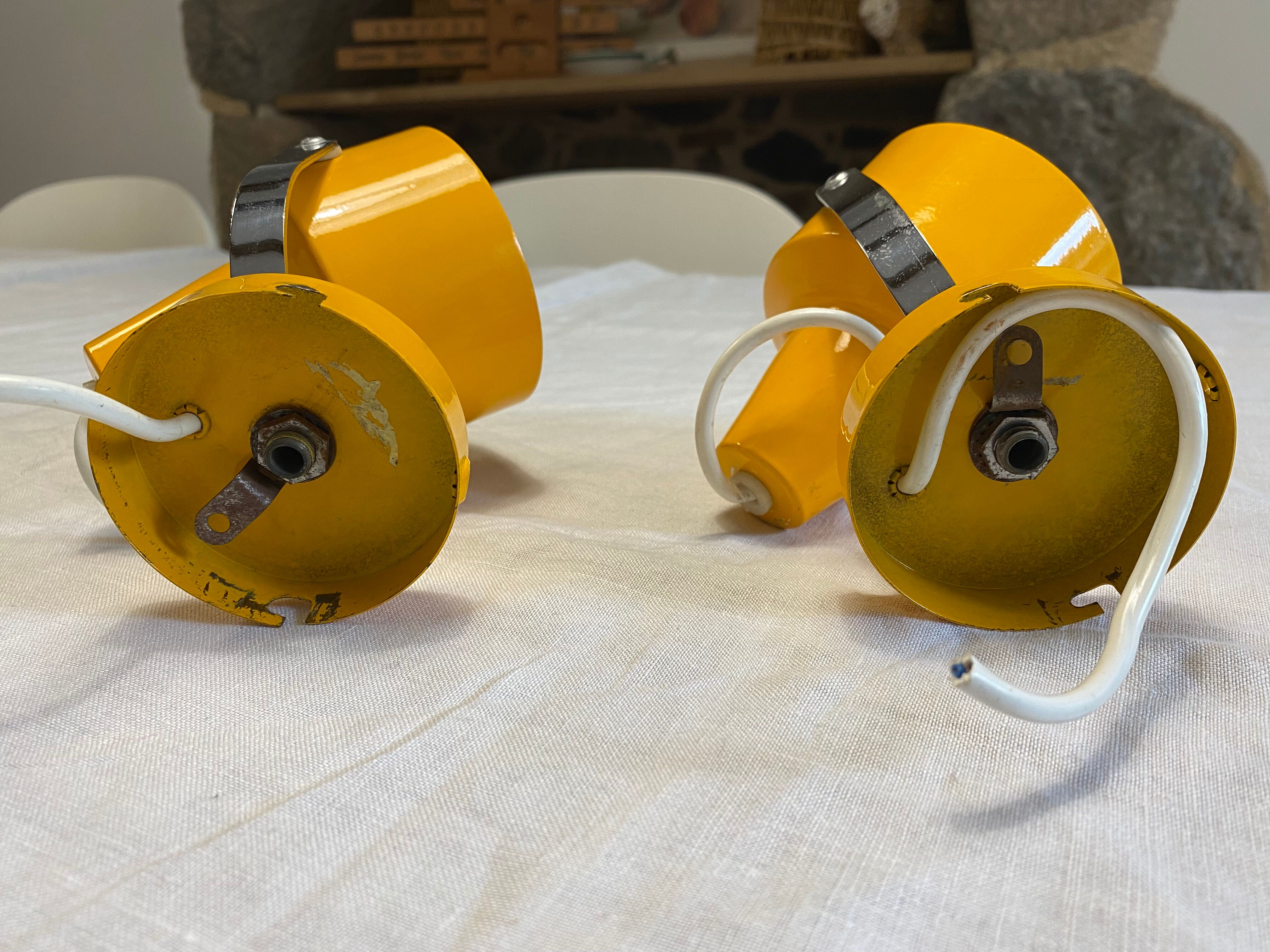 Pair of adjustable vintage wall lamps in yellow and chrome metal. Year 60