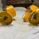Pair of adjustable vintage wall lamps in yellow and chrome metal. Year 60