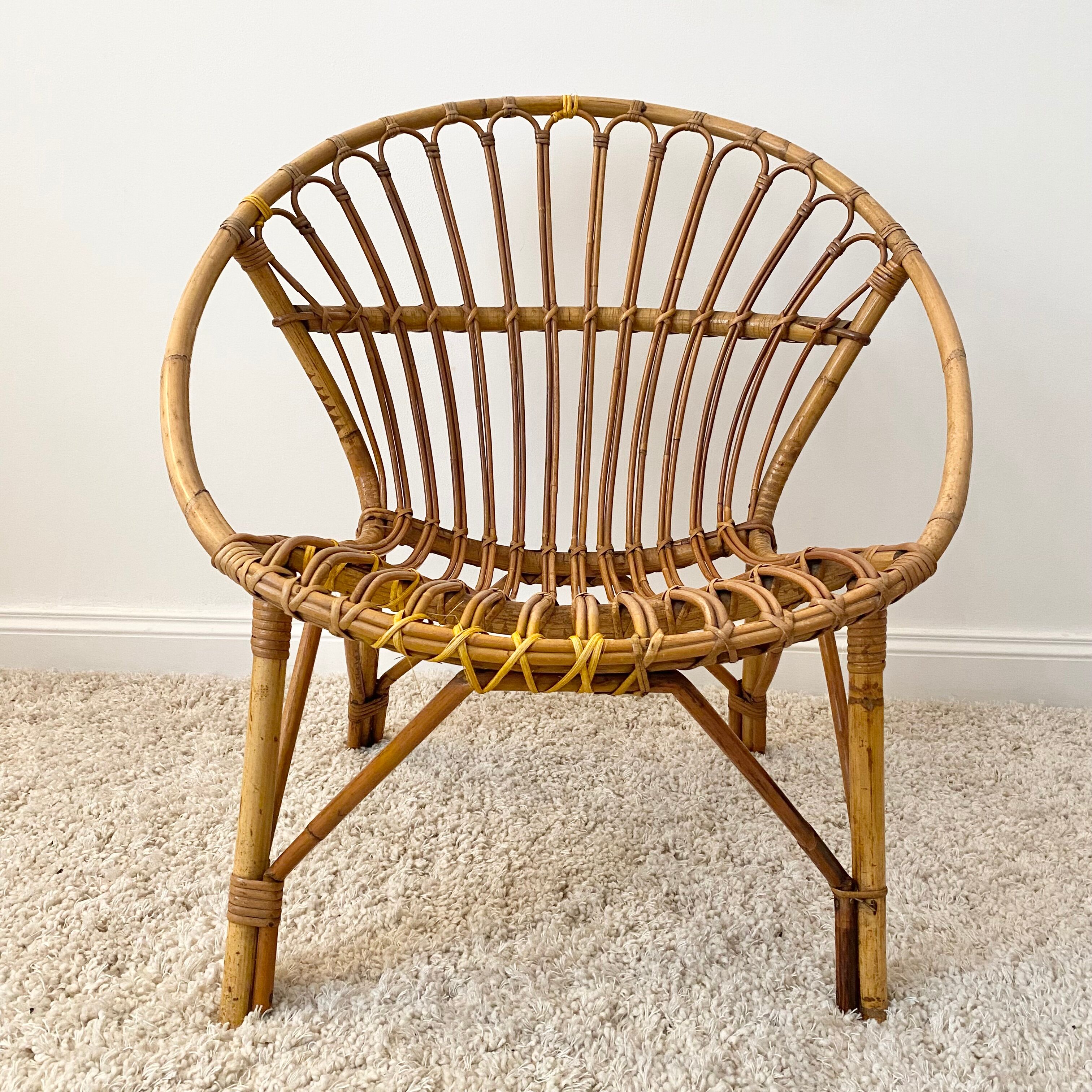 Vintage rattan shell armchair