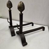 Old pair of wrought iron and bronze andirons