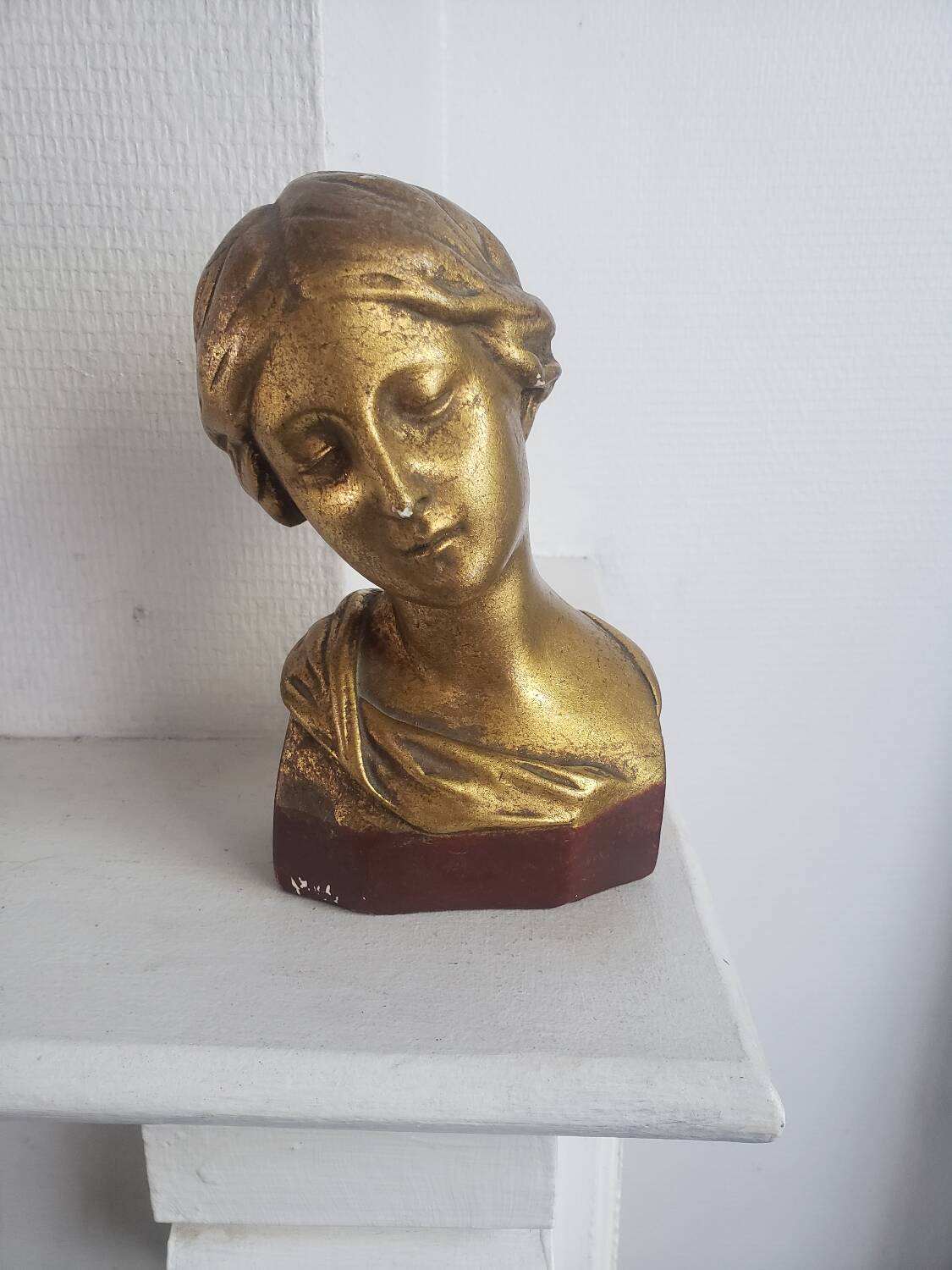Gilded plaster bust