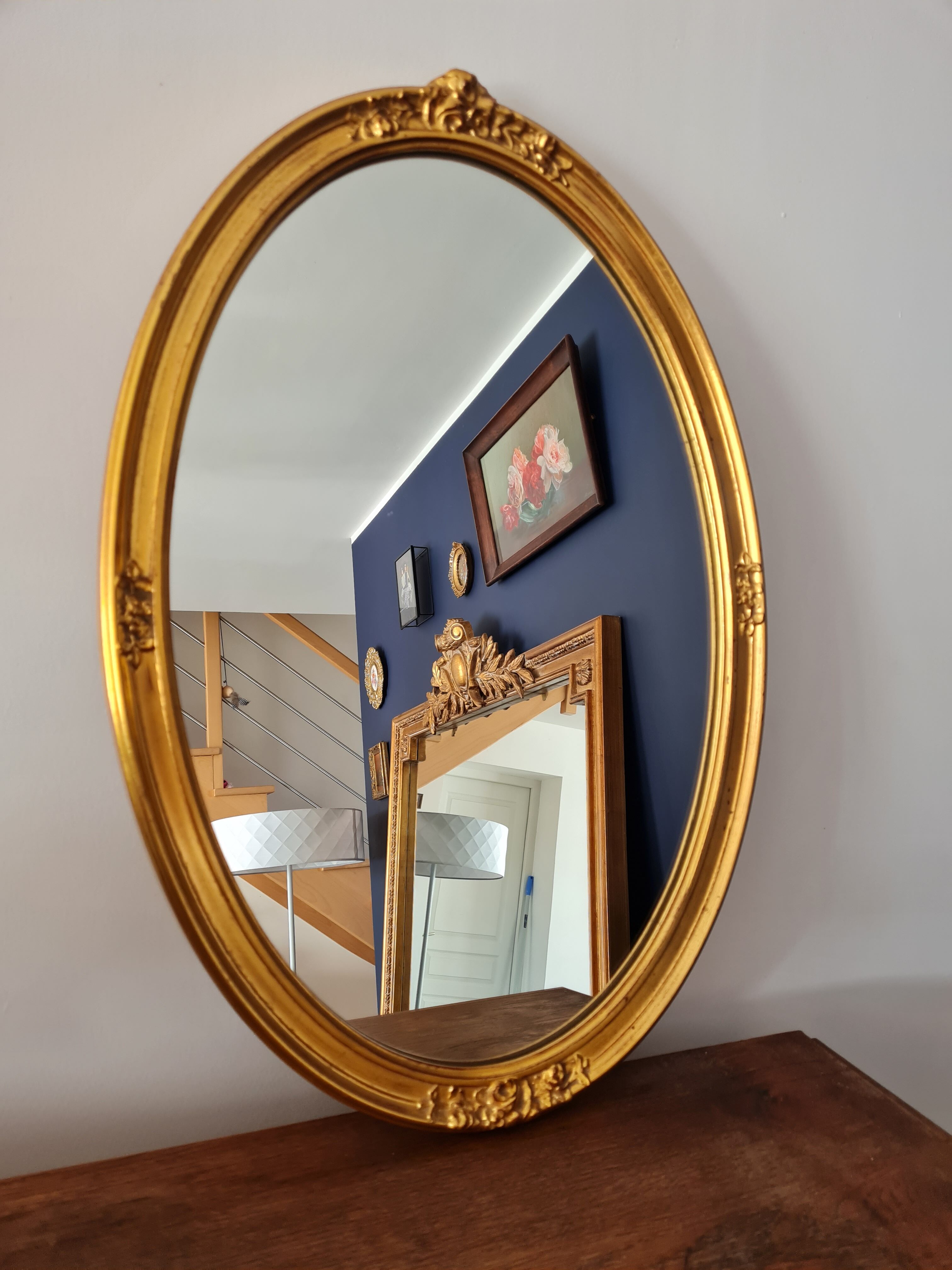 Large oval mirror gilded wood with red plate 44x66cm
