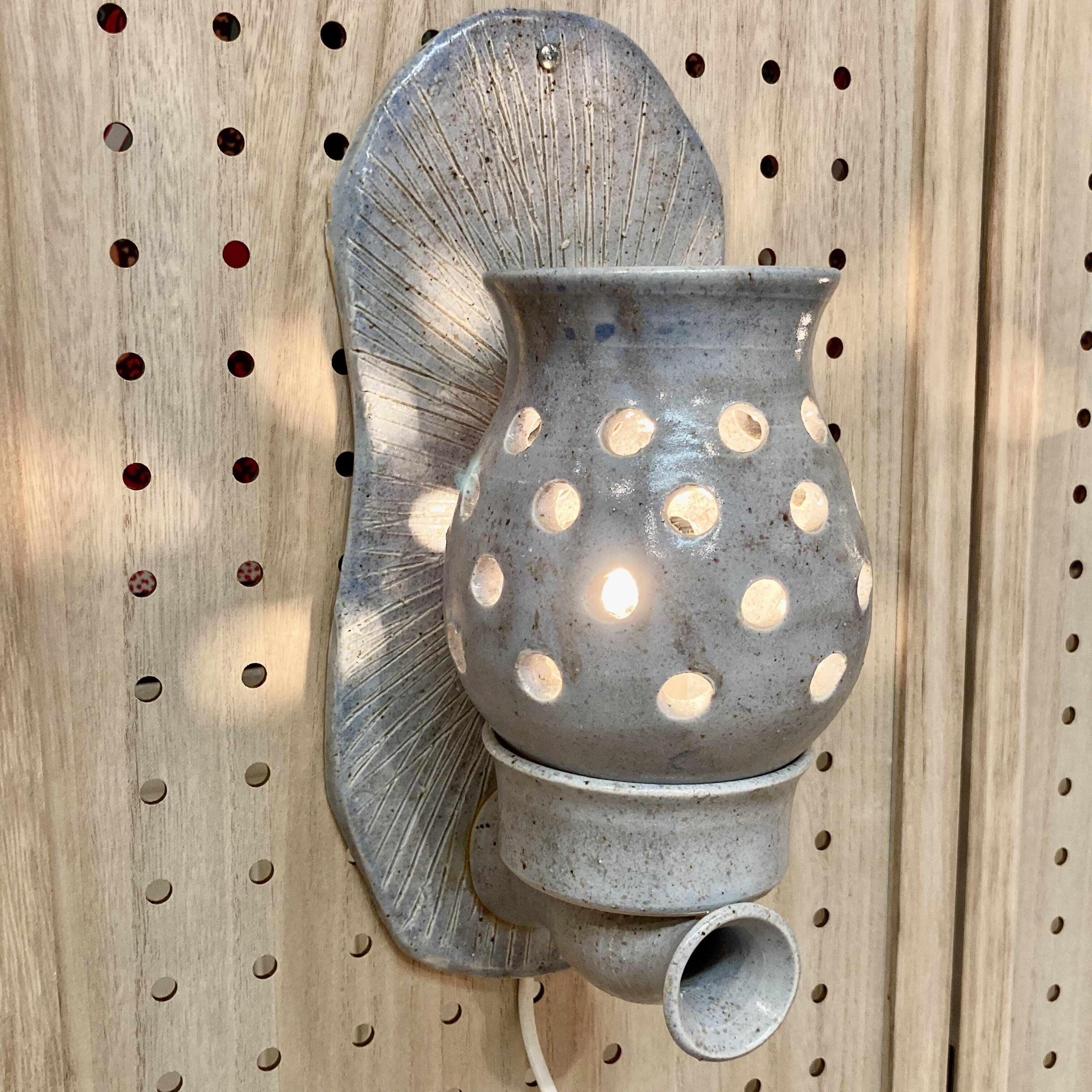 Pair of enamelled terracotta wall lights 1960.