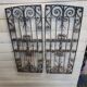 Ancienne paire de grilles en fer forgé