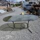 Silver metal table with smoked glass top from the 1970s.