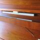 Pairb of Danish teak shelves with wall lights, 1960s