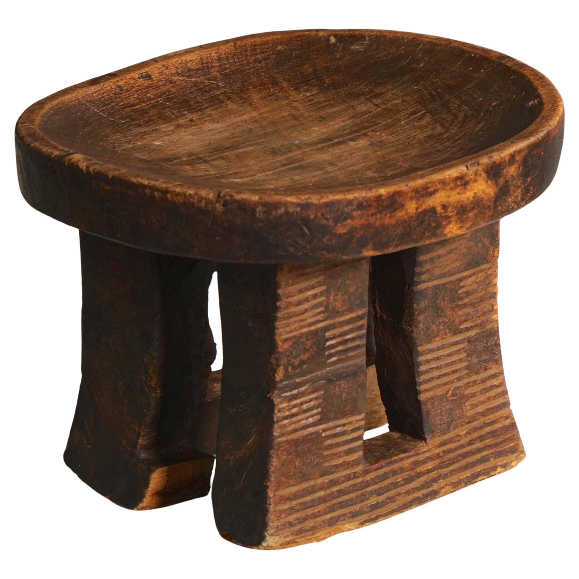 Traditional African tribal stool, hand-carved, Bamileke style, 20th century.
