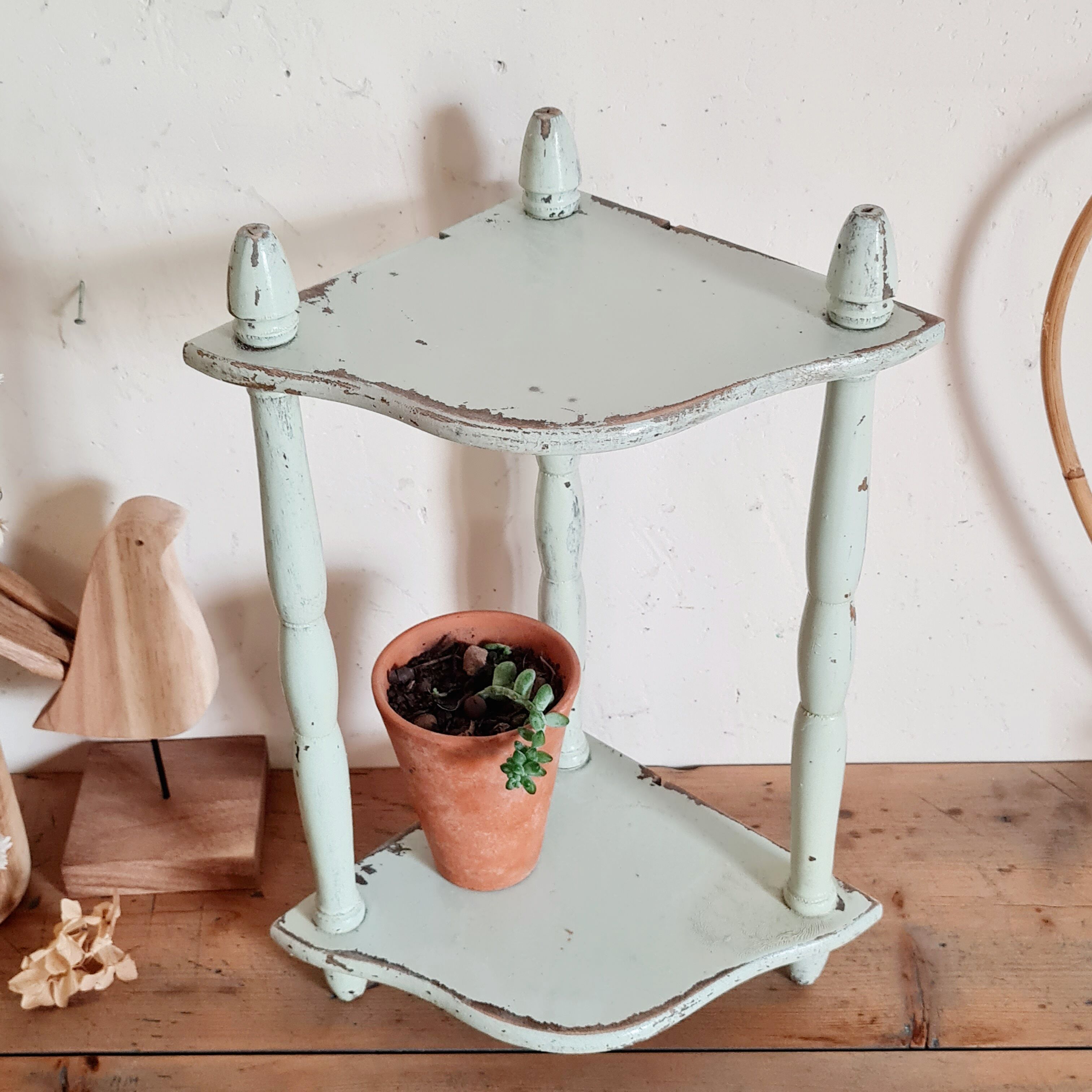 Old green patinated wooden shelf