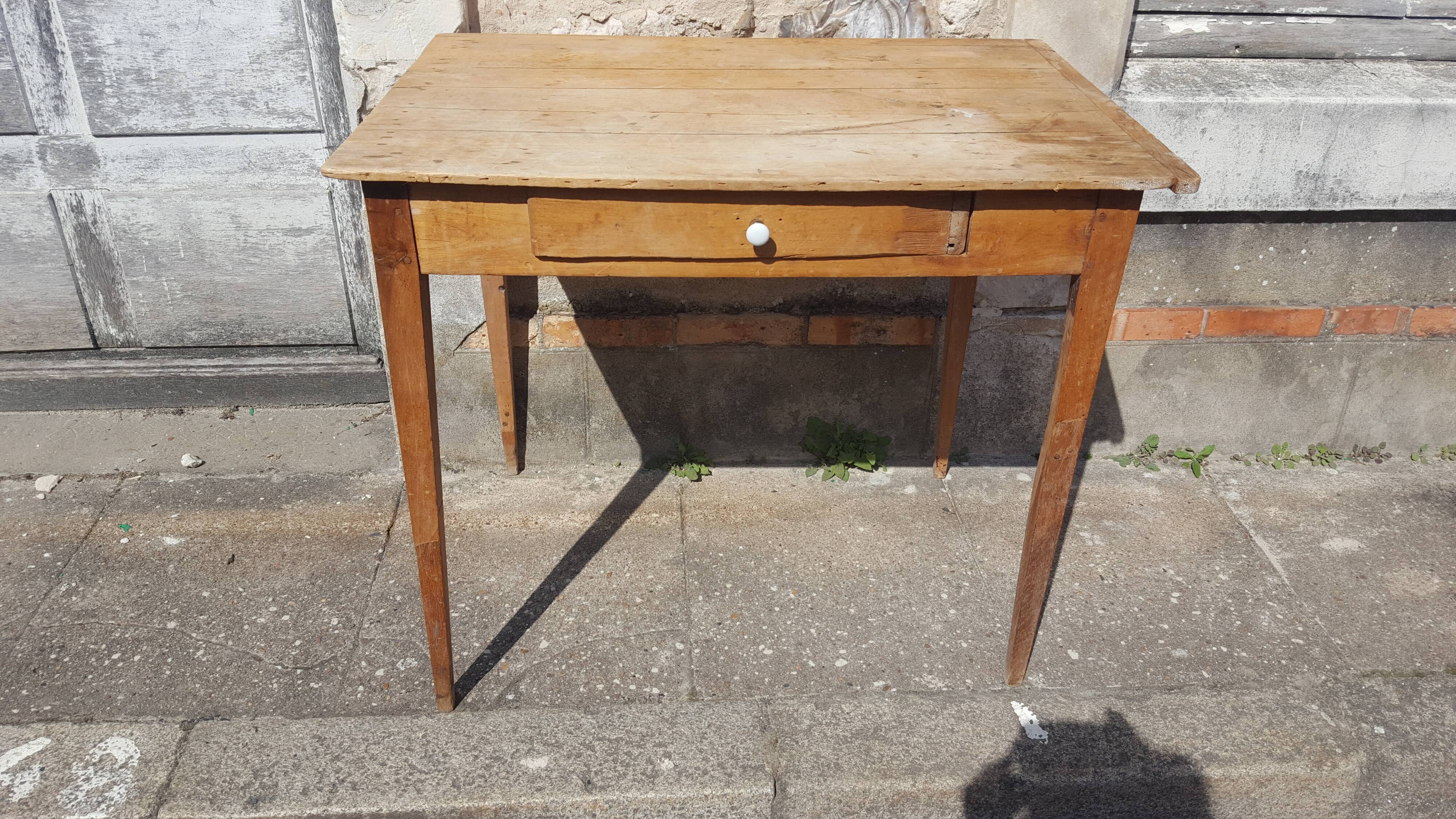 Raw wood farm table with drawer
