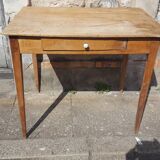Raw wood farm table with drawer