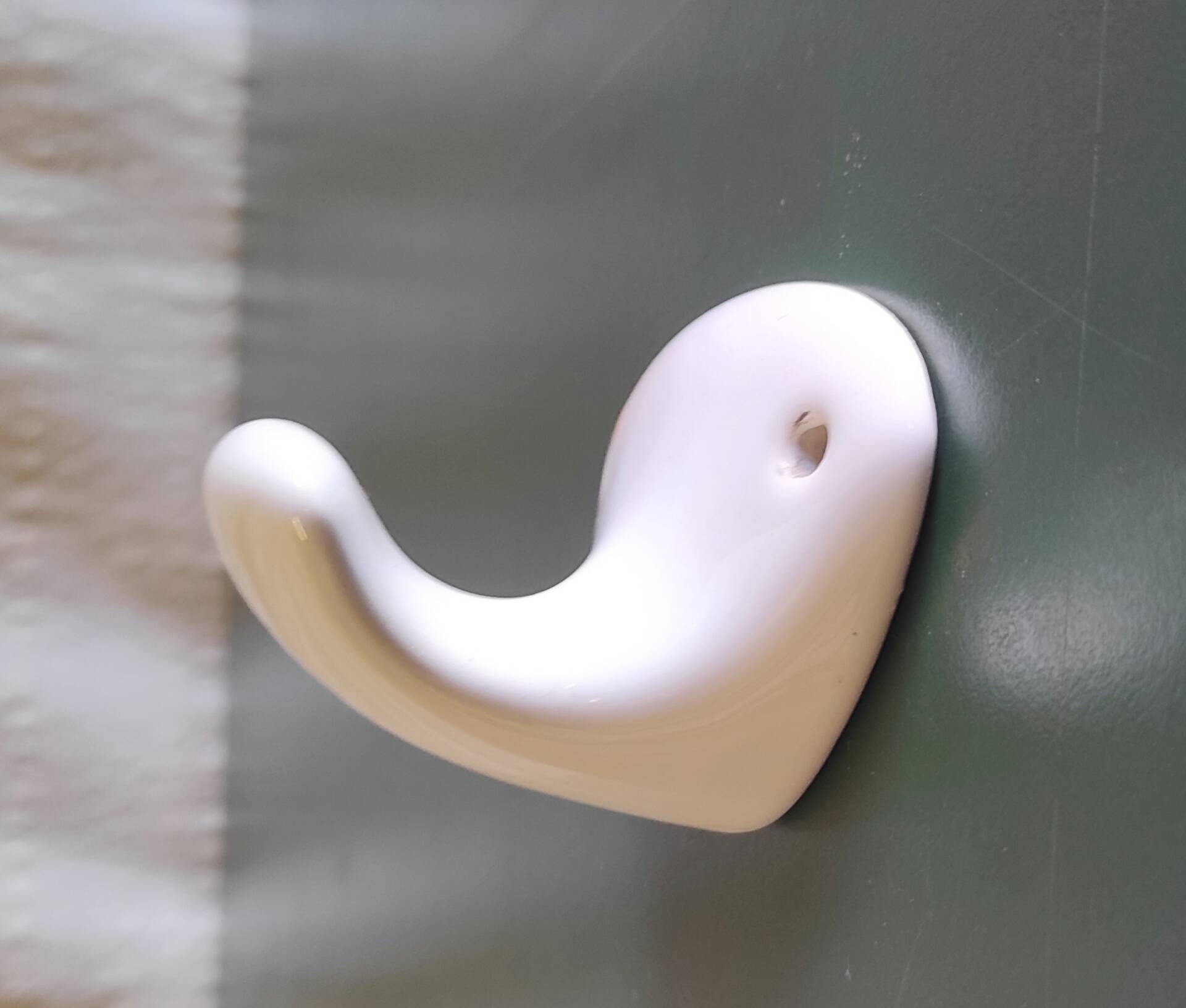 Wall-mounted coat hook in porcelain - mid 20th century