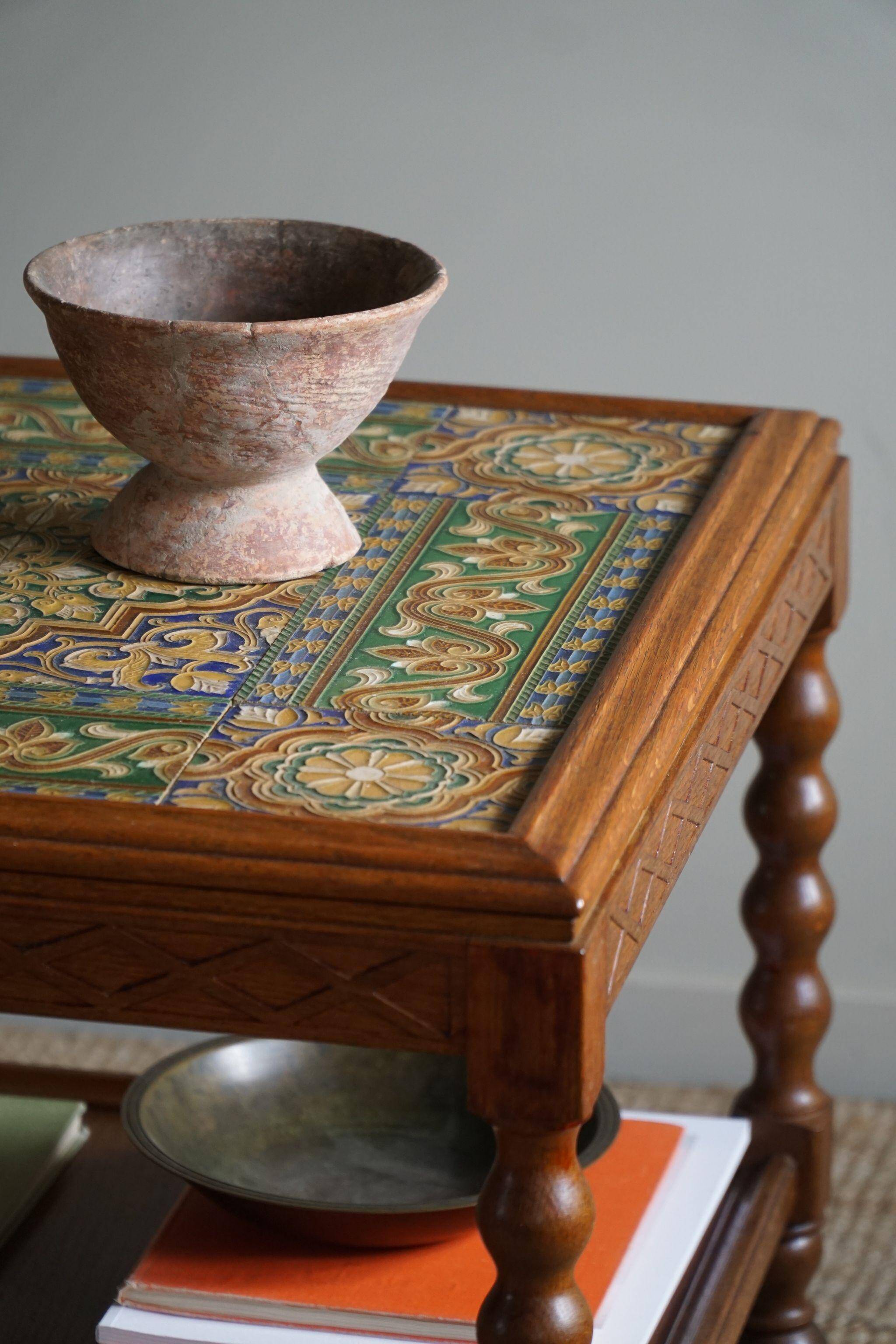 Modern Danish service table with turned spool legs and coloured tiles, 1950s.