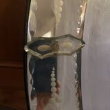 Oval Venetian mirror with close-bezel, early 20th century, flower decoration
