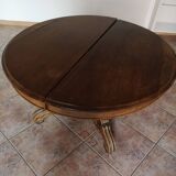 Old table with central leg, small casters, 2 extensions
