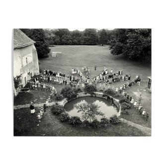 Photographie ancienne d'une chorégraphie d'enfants dessinant une étoile