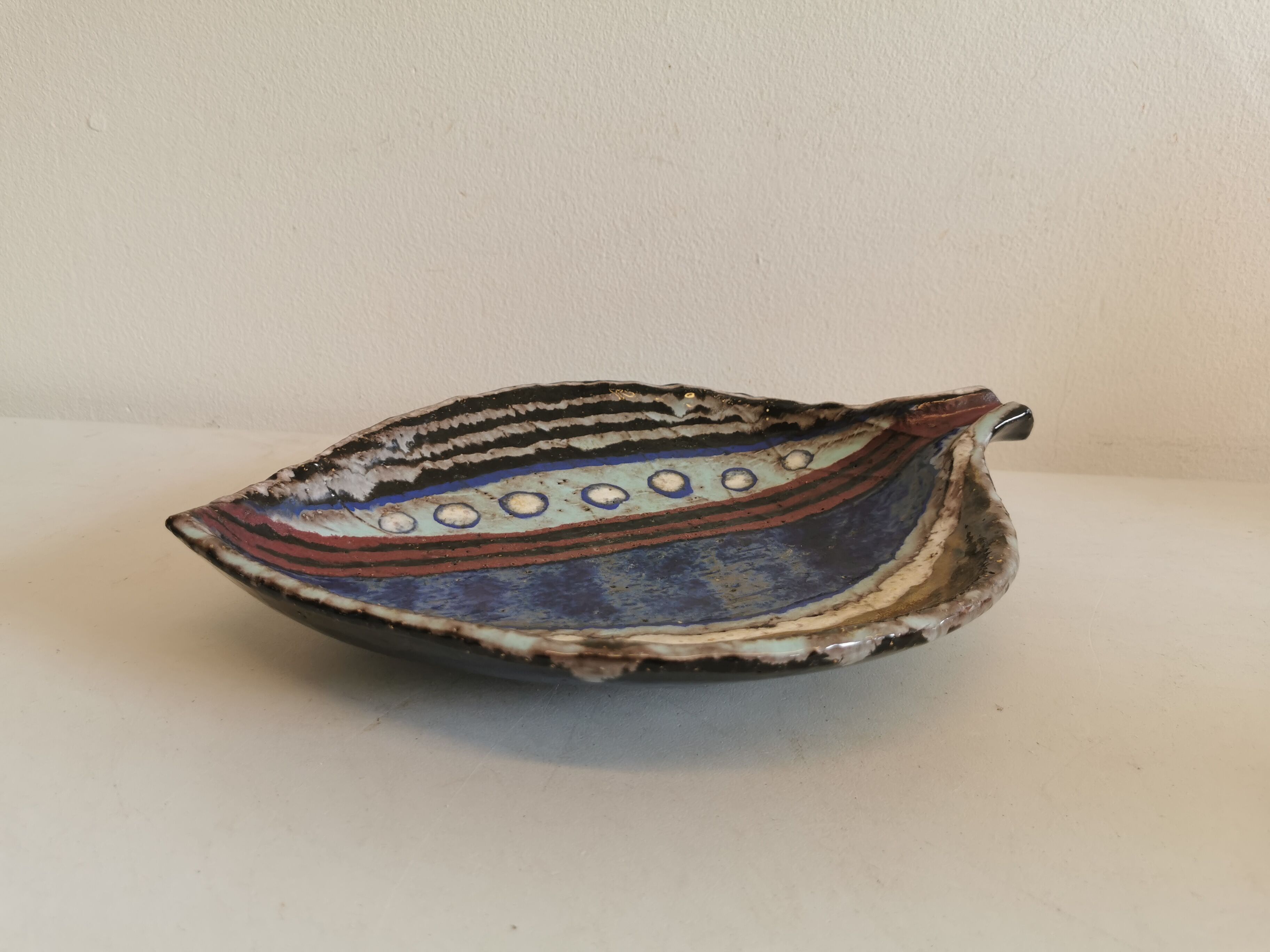 Danish ceramic dish shaped like a leaf.