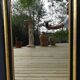 Louis Philippe mirror in blackened and gilded wood, 74 x 102 cm
