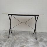 Antique cast iron and marble bistro restaurant table