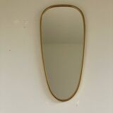 Vintage brass mirror in rear-view mirror shape