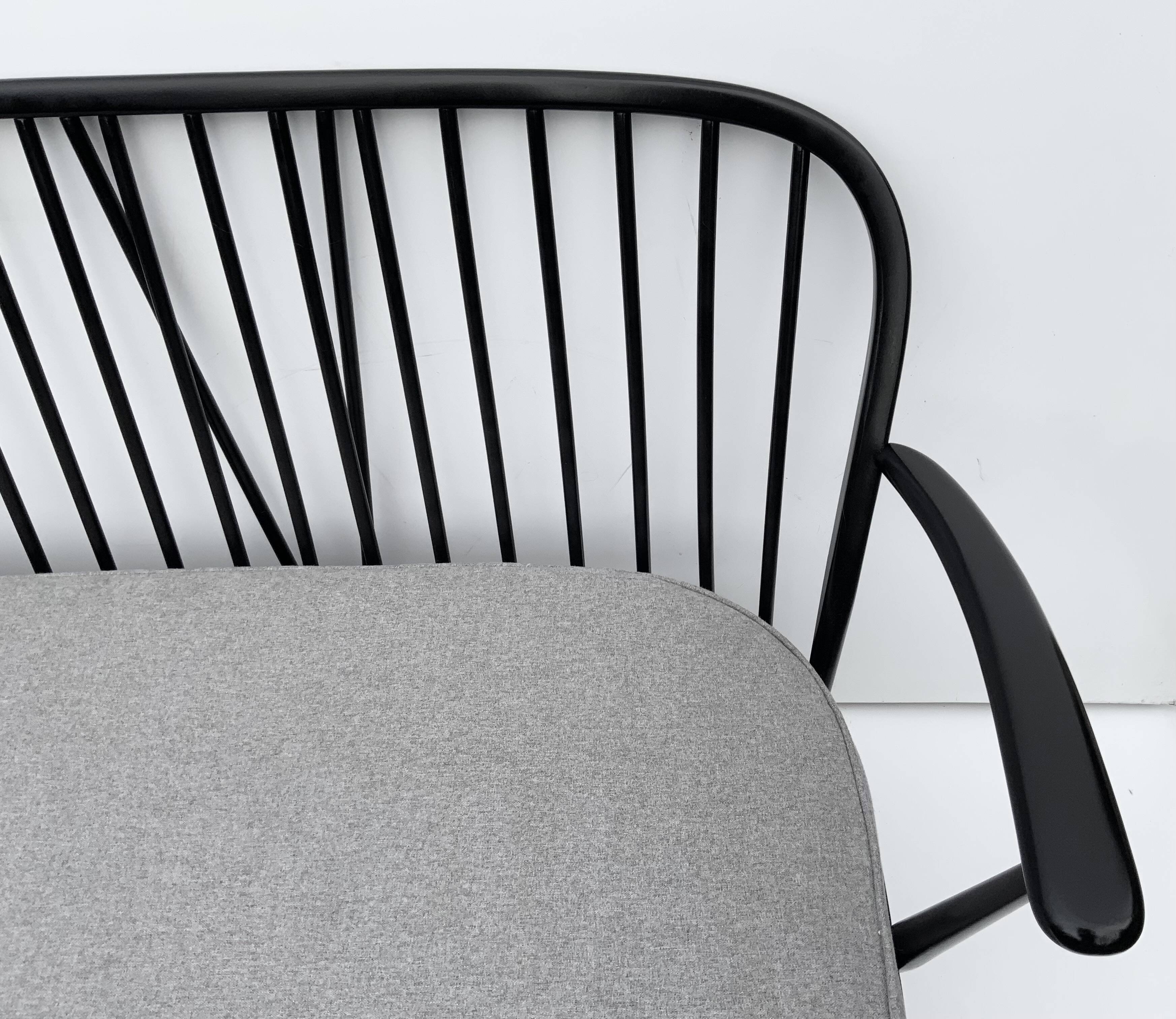 Mid-20th century Ercol Black wood sofa 3 seater
