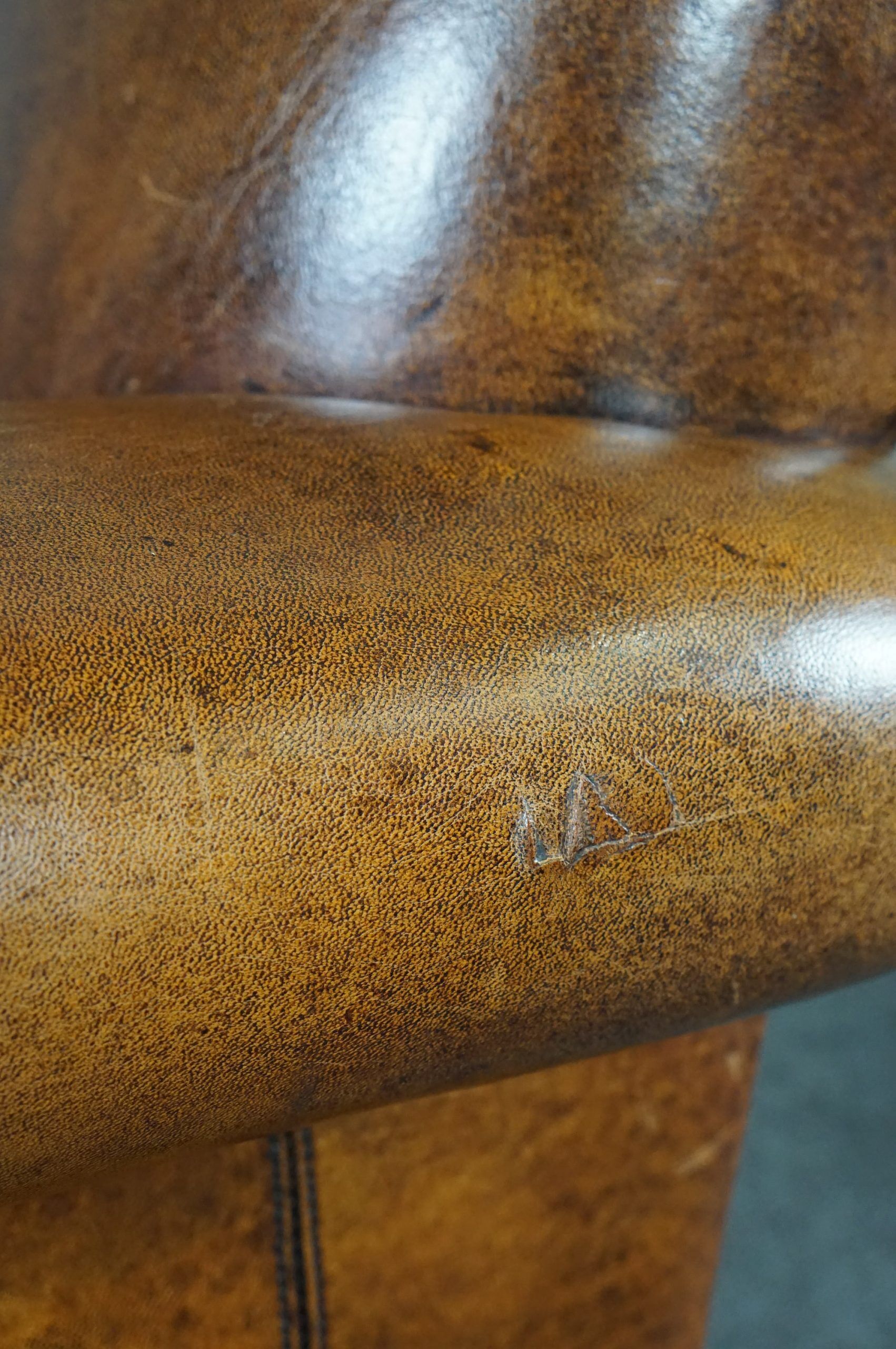 Schapenleren armchair and studio lounge stool