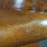 Schapenleren armchair and studio lounge stool