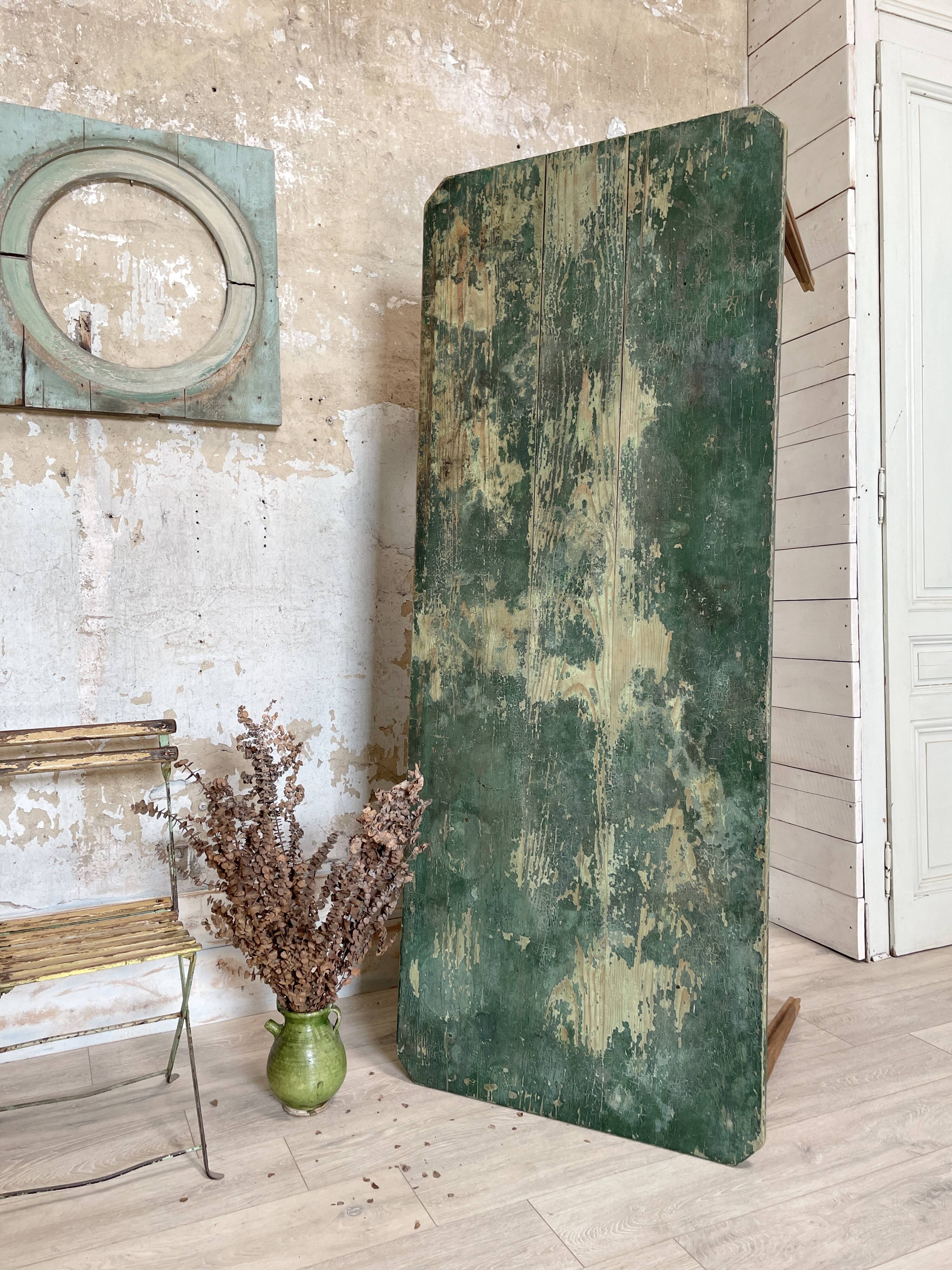 Vintage farm table with spindle legs.