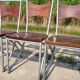 Set of 10 tubular oak bistro dining chairs in vintage industrial style.