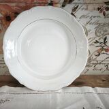 Hollow round plate in porcelain, double gold rim manufacture.