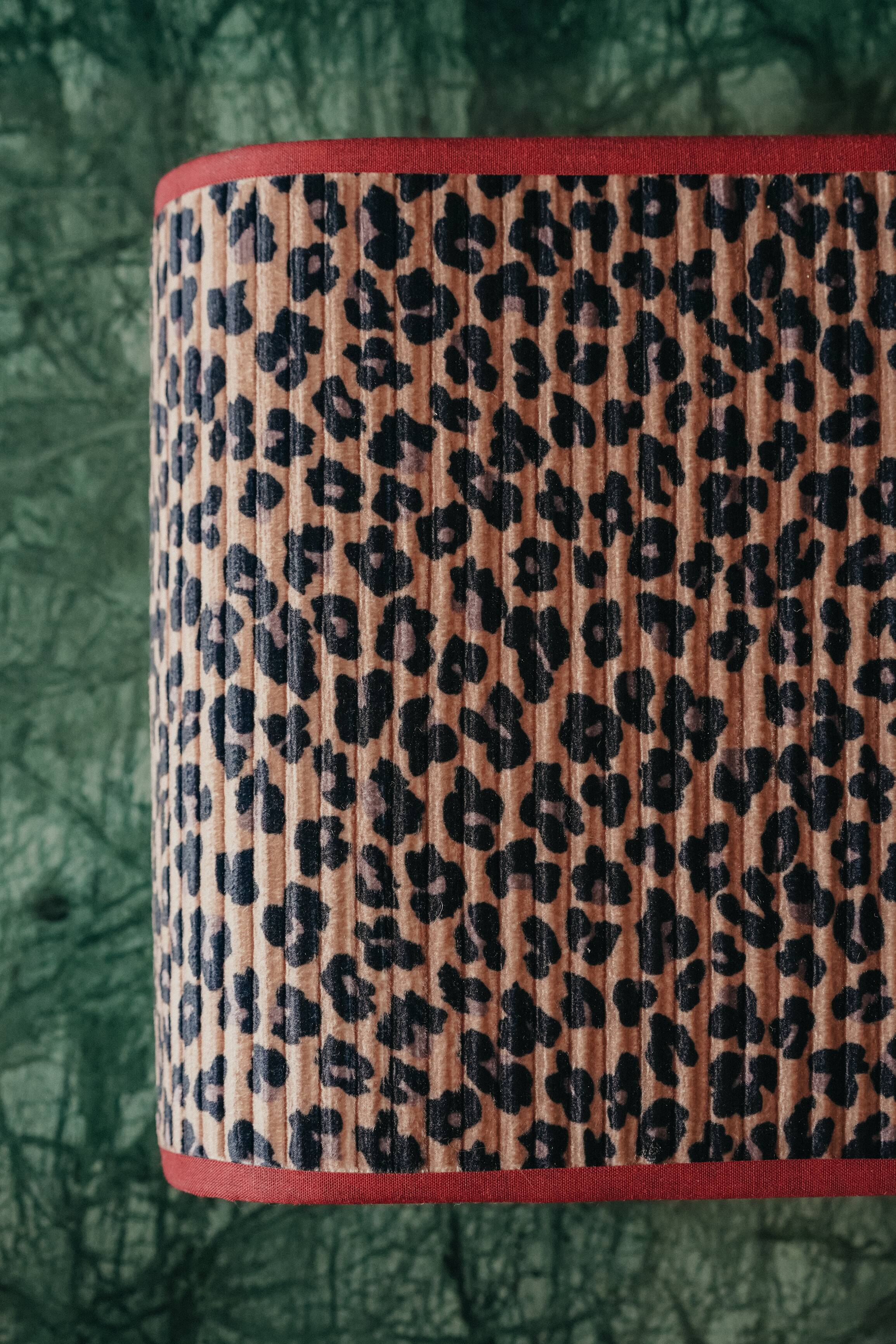 La divine – pleated leopard applique.