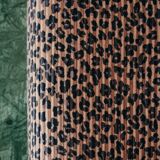 La divine – pleated leopard applique.