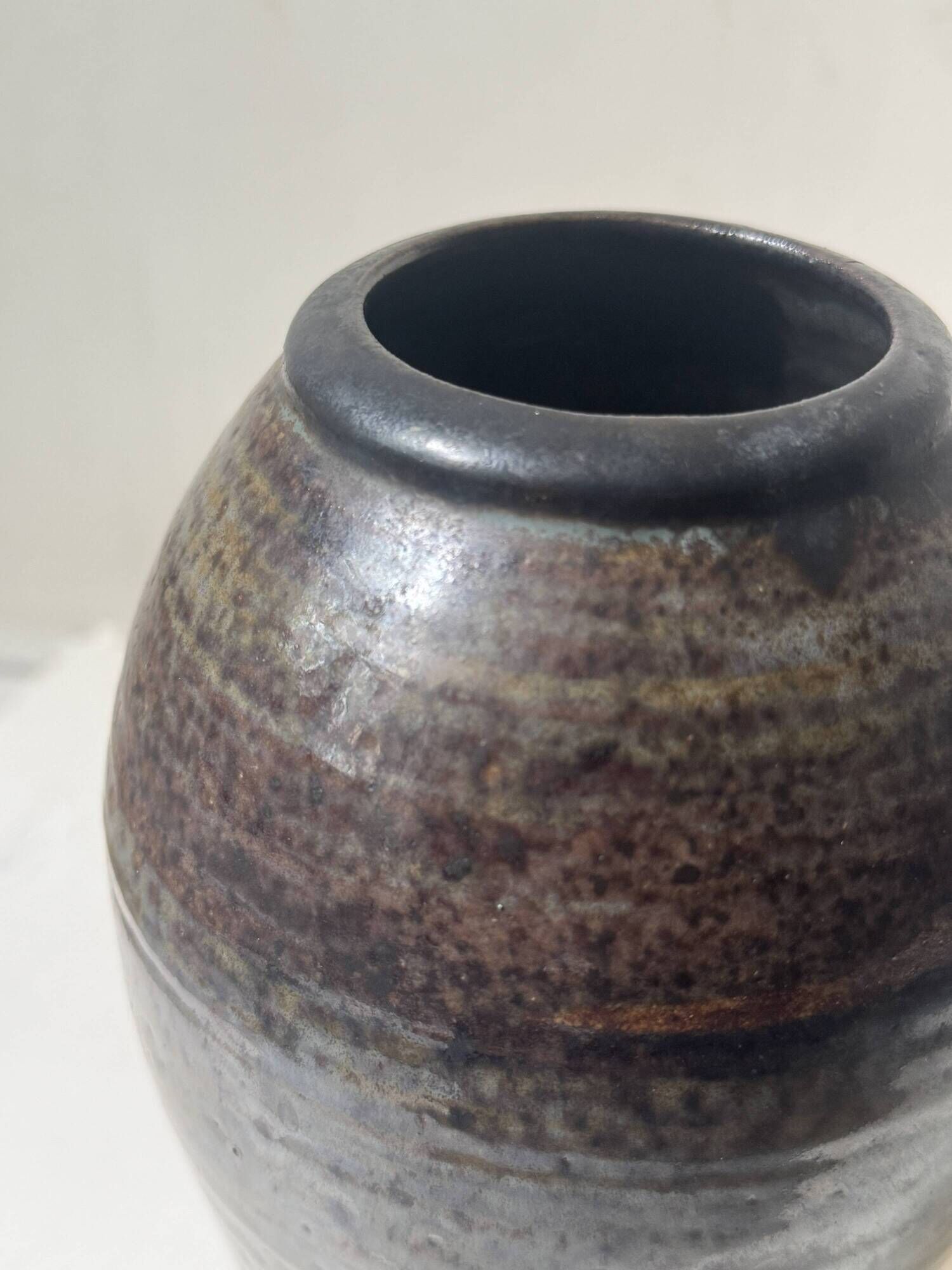 Brown-black glazed stoneware vase, signed underneath the base, circa 1950.